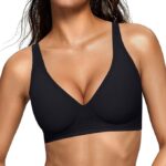 Woman wearing a black deep V wireless bra with wide straps and light support.