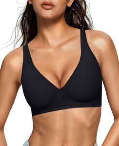 Woman wearing a black deep V wireless bra with wide straps and light support.