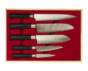 Five kitchen knives in a wooden case with a red velvet interior.
