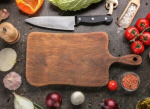 Best cutting boards comparison showing wood, bamboo, and plastic cutting boards from John Boos, OXO, and Farberware