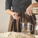 Best measuring cups comparison showing liquid and dry measuring cups from OXO, Pyrex, and Anchor Hocking