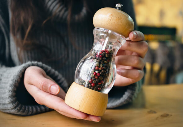 Best pepper grinders comparison showing manual and electric pepper mills from Peugeot, OXO, and Cole & Mason
