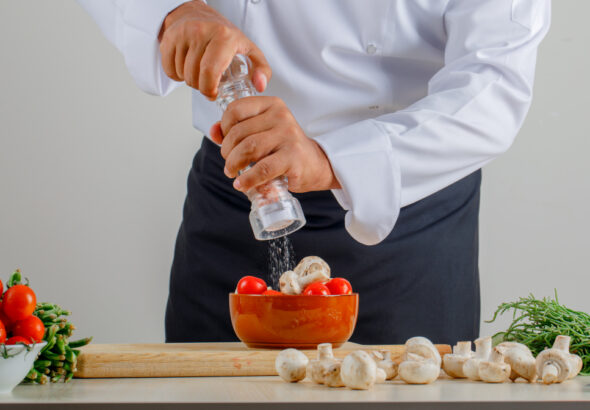 Best salt and pepper shakers comparison showing ceramic, glass, and stainless steel shaker sets from Le Creuset, Menu, and OXO