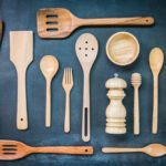 Best kitchen utensils comparison showing spatulas, tongs, and cooking spoons from OXO, KitchenAid, and GIR