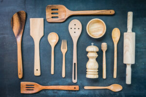 Best kitchen utensils comparison showing spatulas, tongs, and cooking spoons from OXO, KitchenAid, and GIR