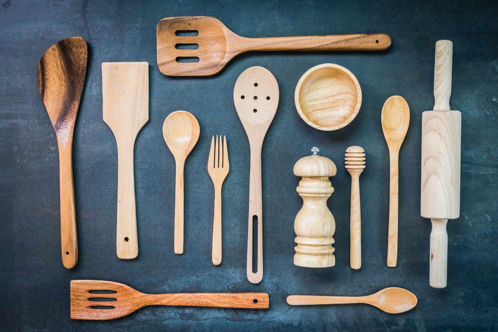 Best kitchen utensils comparison showing spatulas, tongs, and cooking spoons from OXO, KitchenAid, and GIR