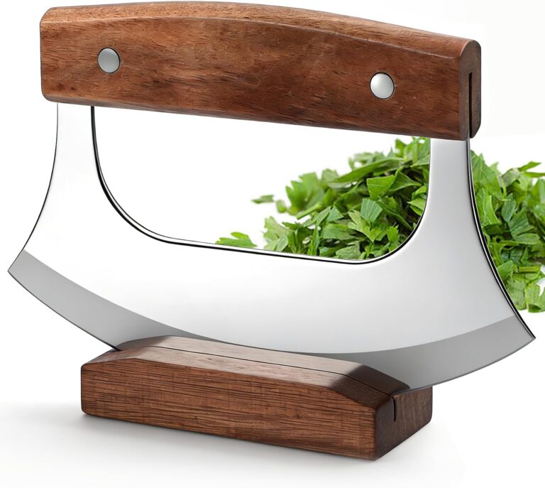 Rocker knife with curved blade cutting food on a plate